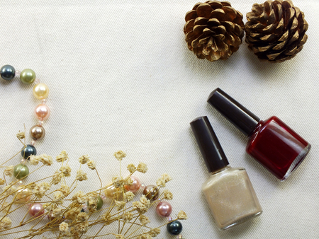 bottles nail polish with space background top viewの写真素材