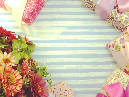 beautiful romantic gift box and flower on blue backgroundの写真素材