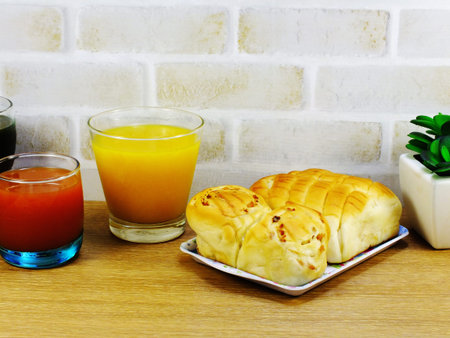 homemade bread with bacon ham pork mayonnaise and fruit juice