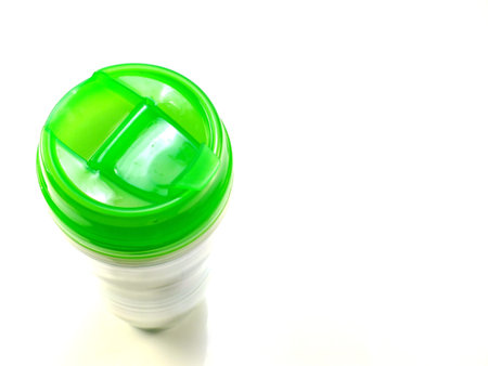 top view of plastic water bottle on white background