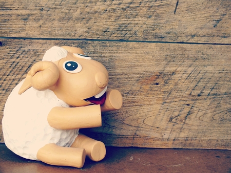 decorative smiling sheep interior garden decor ceramic statue with filter colorの写真素材