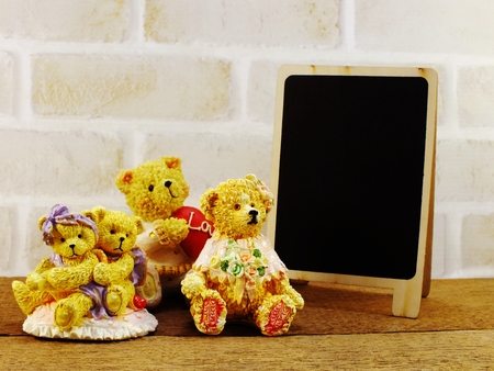 space wooden background with teddy bear decortionの写真素材