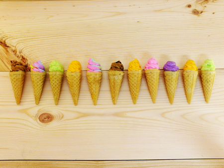 pastel meringue cookies rainbow with mini cone homemadeの写真素材