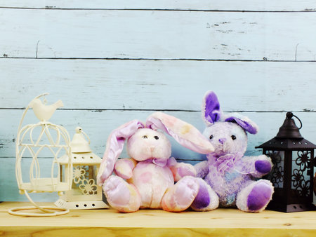 rabbit doll and beautiful candle lantern decor with space background