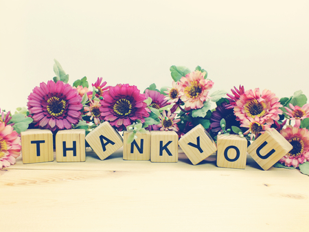 lettering thank you with artificial flowers bouquetの写真素材