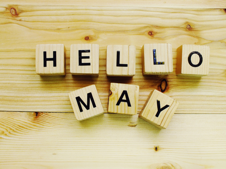 hello may  word wooden block on wooden backgroundの写真素材