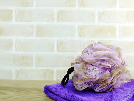 plastic puff shower and towel and space backgroundの写真素材