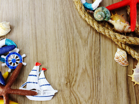 Top view of nautical style home decor with space on wooden backgroundの写真素材