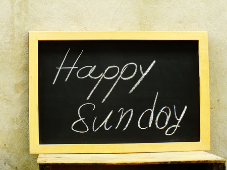 sunday alphabet letters write on black boardの写真素材