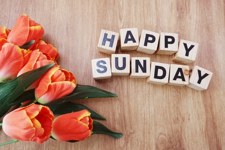 happy sunday on wooden backgroundの写真素材