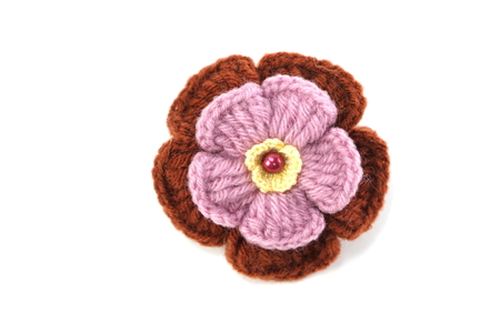 handmade knitting crochet flowers isolated on white backgroundの写真素材