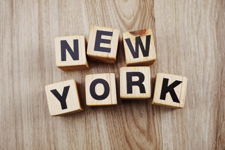 alphabet blocks letters new york on wood backgroundの写真素材