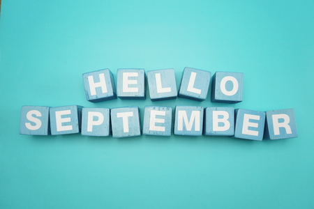 hello september alphabet letters on blue backgroundの写真素材