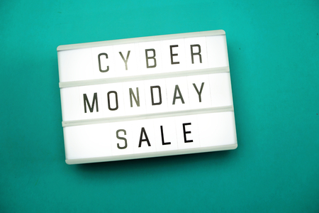 cyber monday sale flat lay top view on blue backgroundの写真素材