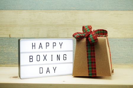 Happy Boxing Day with light box and gift box presentの写真素材