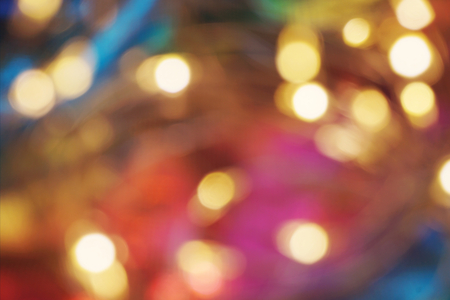abstract colorful bokeh background of christmas lightの写真素材
