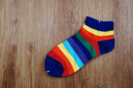 colorful socks on wooden backgroundの写真素材