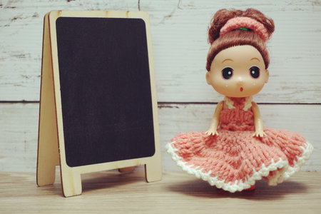 Space wooden easel blackboard with space copy on wooden backgroundの写真素材