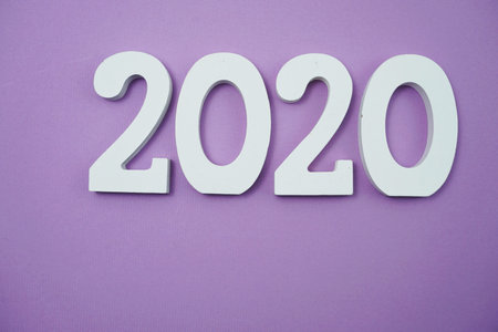 2020 happy new year with space copy on purple background