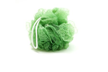 Green bath soft with rope isolated on white backgroundの写真素材