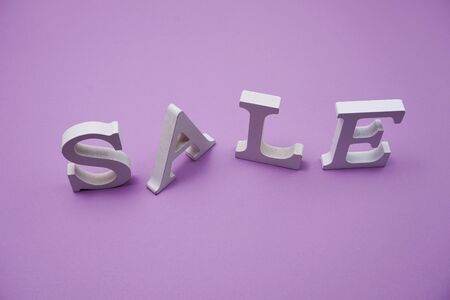 Sale Alphabet Letters with space copy on purple background business conceptの写真素材