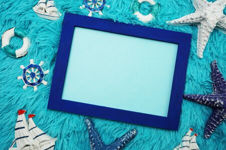 Mock up flat lay space photo frame with nautical marine decorationの写真素材
