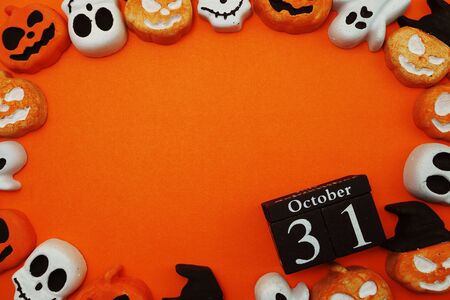 Halloween 31 october with pumpkin decorate with space copy on orange backgroundの写真素材