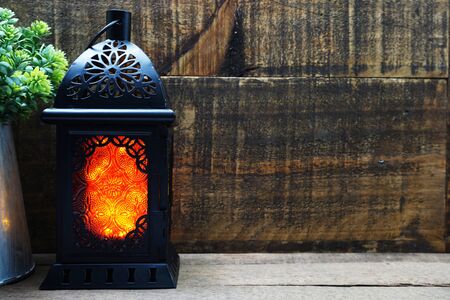 Ramadan Lantern Arabic decoration on wooden backgroundの写真素材