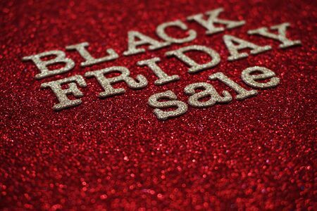 Black Friday sale shopping concept alphabet on red backgroundの写真素材