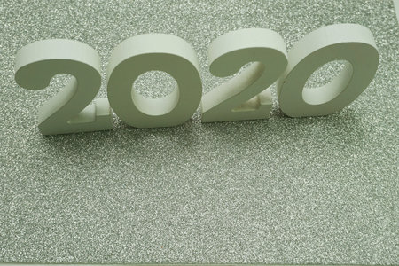 Happy New year 2020 with space copy on silver glitter background