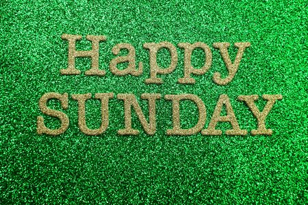 Happy Sunday alphabet letter on green glitter backgroundの写真素材