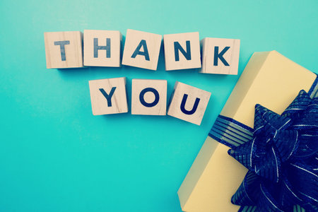 Thank You alphabet letters  with space copy on blue background