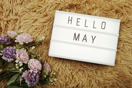 Hello May word in light box and flower bouquetの写真素材