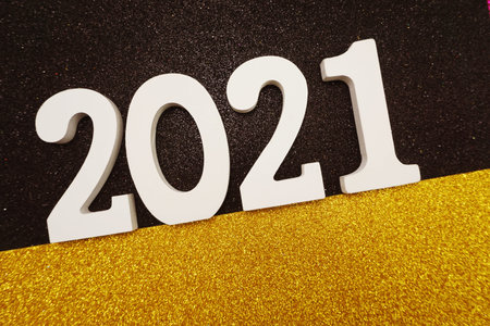 2021 Happy New Year with space copy on black and gold glitter background
