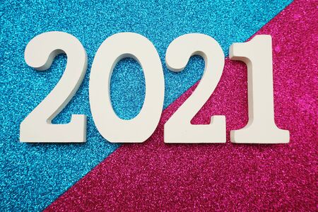 2021 Happy New Year with space copy on blue and purple glitter backgroundの写真素材