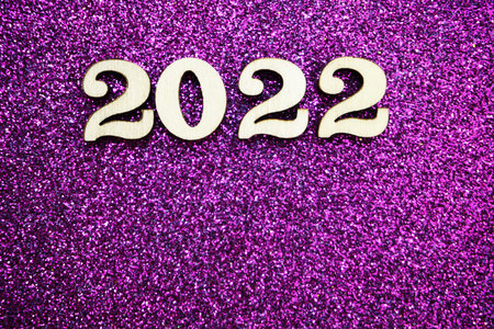 Happy New year 2022 with space copy on purple glitter background
