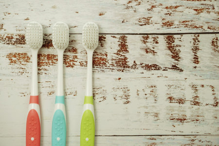 Toothbrush with space copy on wooden background