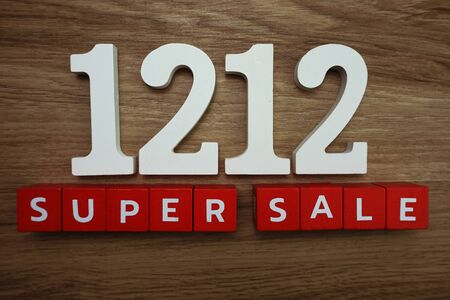 1212 Super Sale alphabet letters on wooden backgroundの写真素材