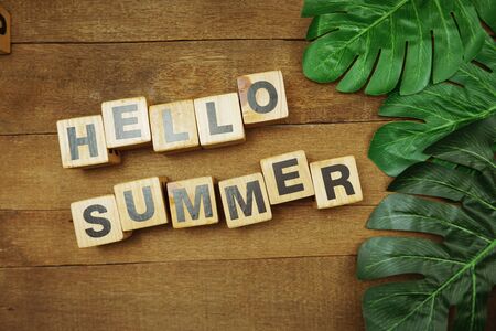 Hello Summer alphabet letter on wooden backgroundの写真素材