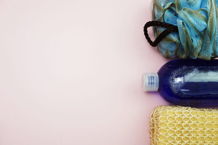Shower accessories bath items on pink backgroundの写真素材