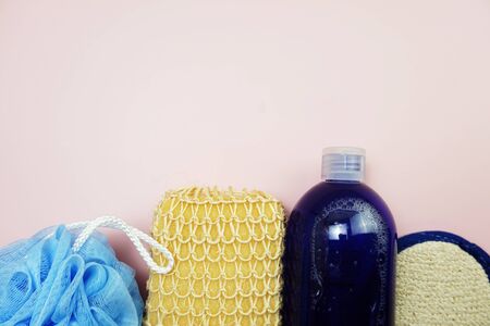 Shower accessories bath items on pink backgroundの写真素材
