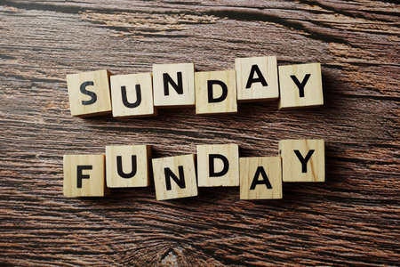 Sunday Funday alphabet letter on wooden backgroundの写真素材