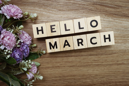 Hello March alphabet letter with space copy on wooden background