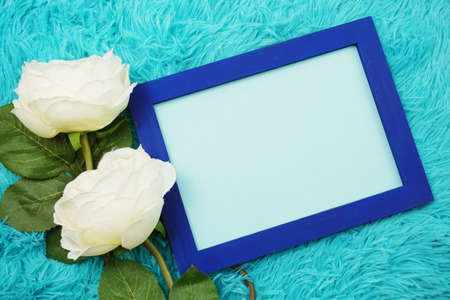 Flat lay Mock-up space Photo Frame with peony flower decorationの写真素材