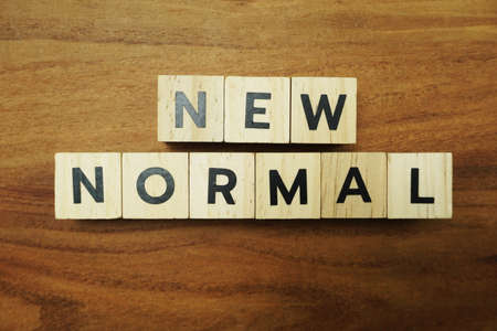 New Normal alphabet letters on wooden backgroundの写真素材