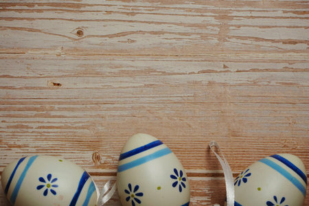 Easter Eggs with space copy on wooden background
