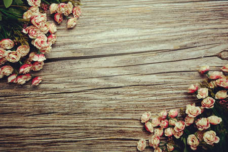 Flowers Border Frame wiht space copy on wooden backgroundの写真素材
