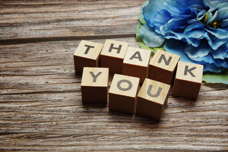 Thank You alphabet letters with space copy on wooden backgroundの写真素材