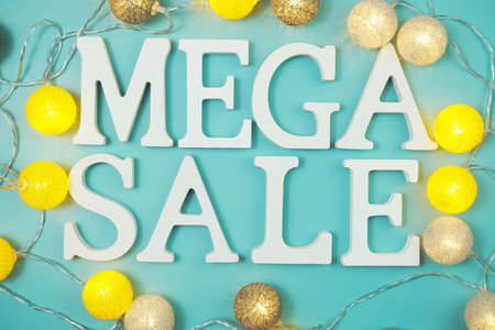 Mega Sale alphabet letter with LED cotton balls on blue backgroundの写真素材