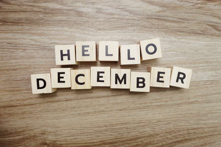 Hello December alphabet letters on wooden backgroundの写真素材